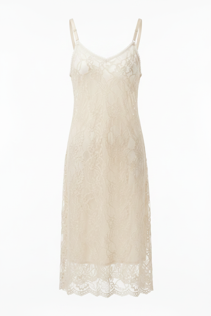 Lace slip dress in light ivory with spaghetti straps, V-neckline, floral lace overlay, and scalloped hem – studio hero shot on white background