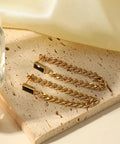 MAPLE CHAIN EARRINGS by CRUX