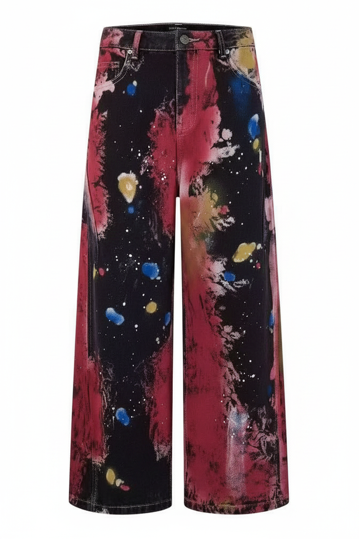Picasso Jeans front view, wide-leg paint splatter denim on white studio background