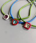 FLORAL ROPE NECKPIECE by CRUX